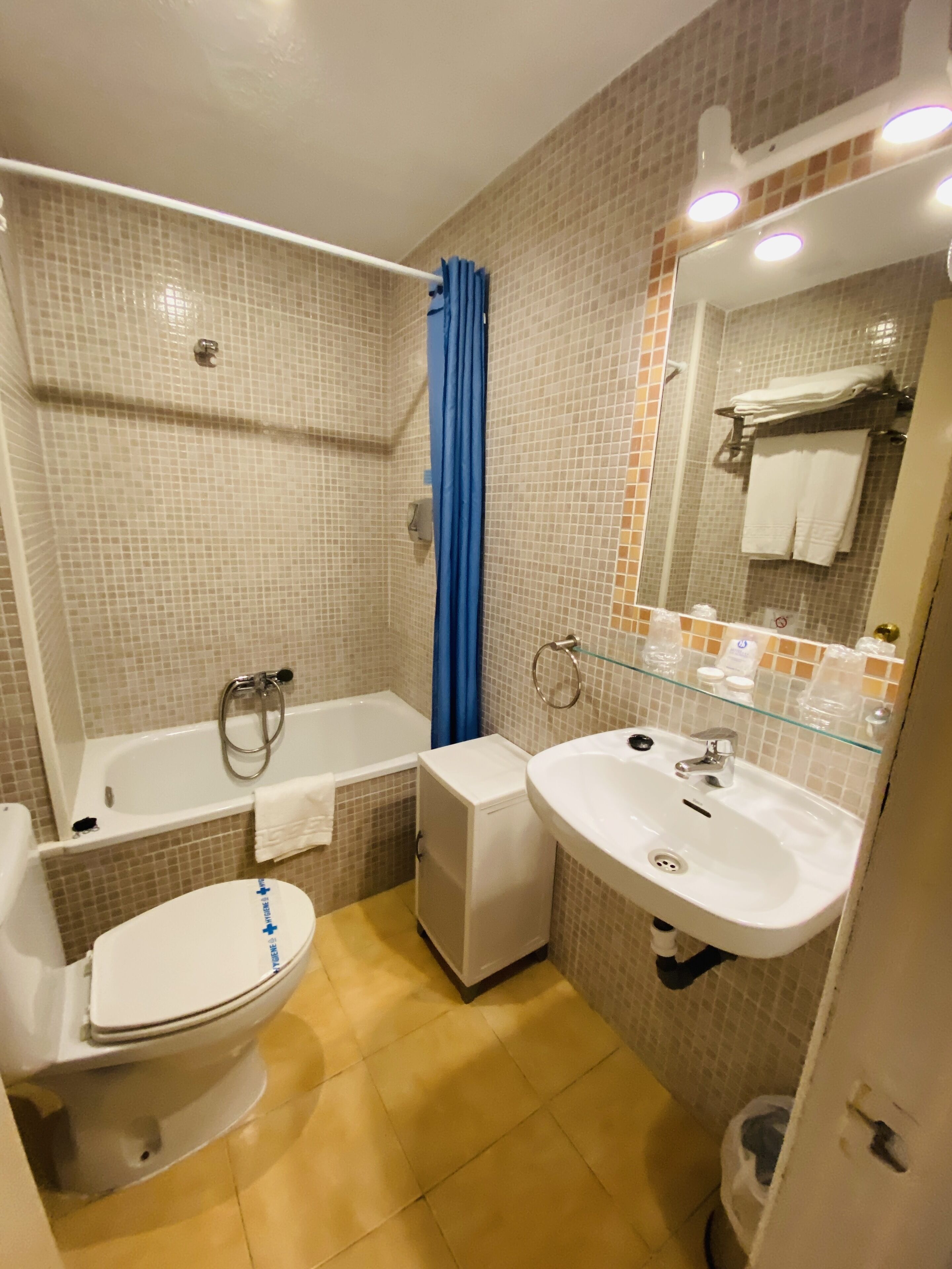 economy room, 2 single beds | bathroom | hair dryer, towels