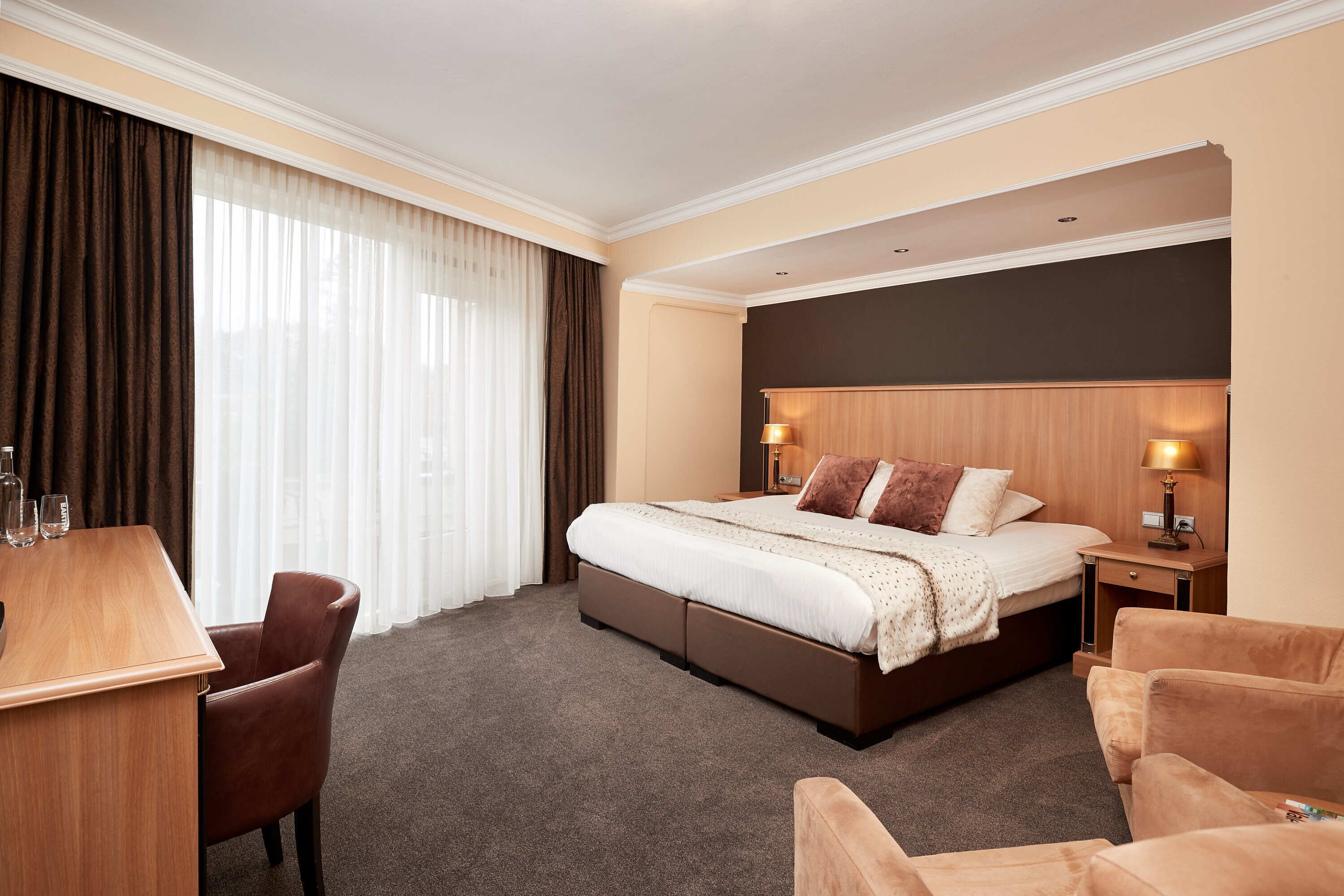 comfort room | 1 bedroom, desk, blackout curtains, iron/ironing board