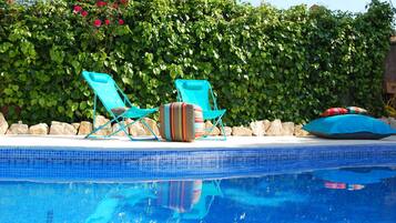 Outdoor pool, open 8:00 AM to 11:30 PM, pool umbrellas, sun loungers