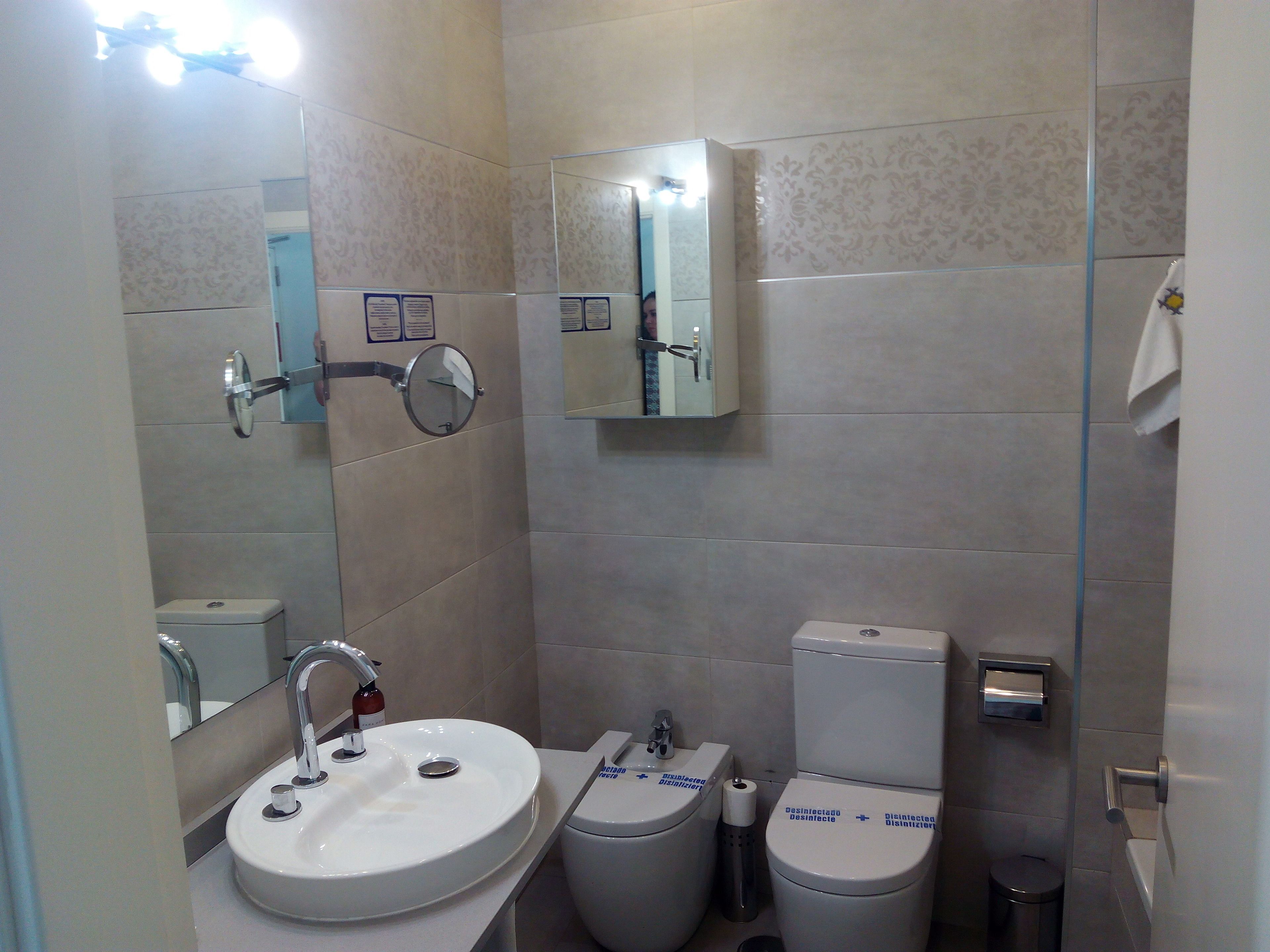 hair dryer, bidet, towels