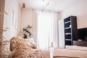 Apartment, 2 Bedrooms | Living area | 38-inch flat-screen TV with satellite channels, TV