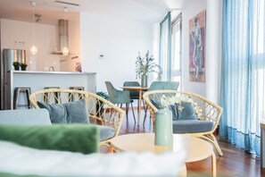 Apartment, 1 Bedroom | Living area | 38-inch flat-screen TV with satellite channels, TV