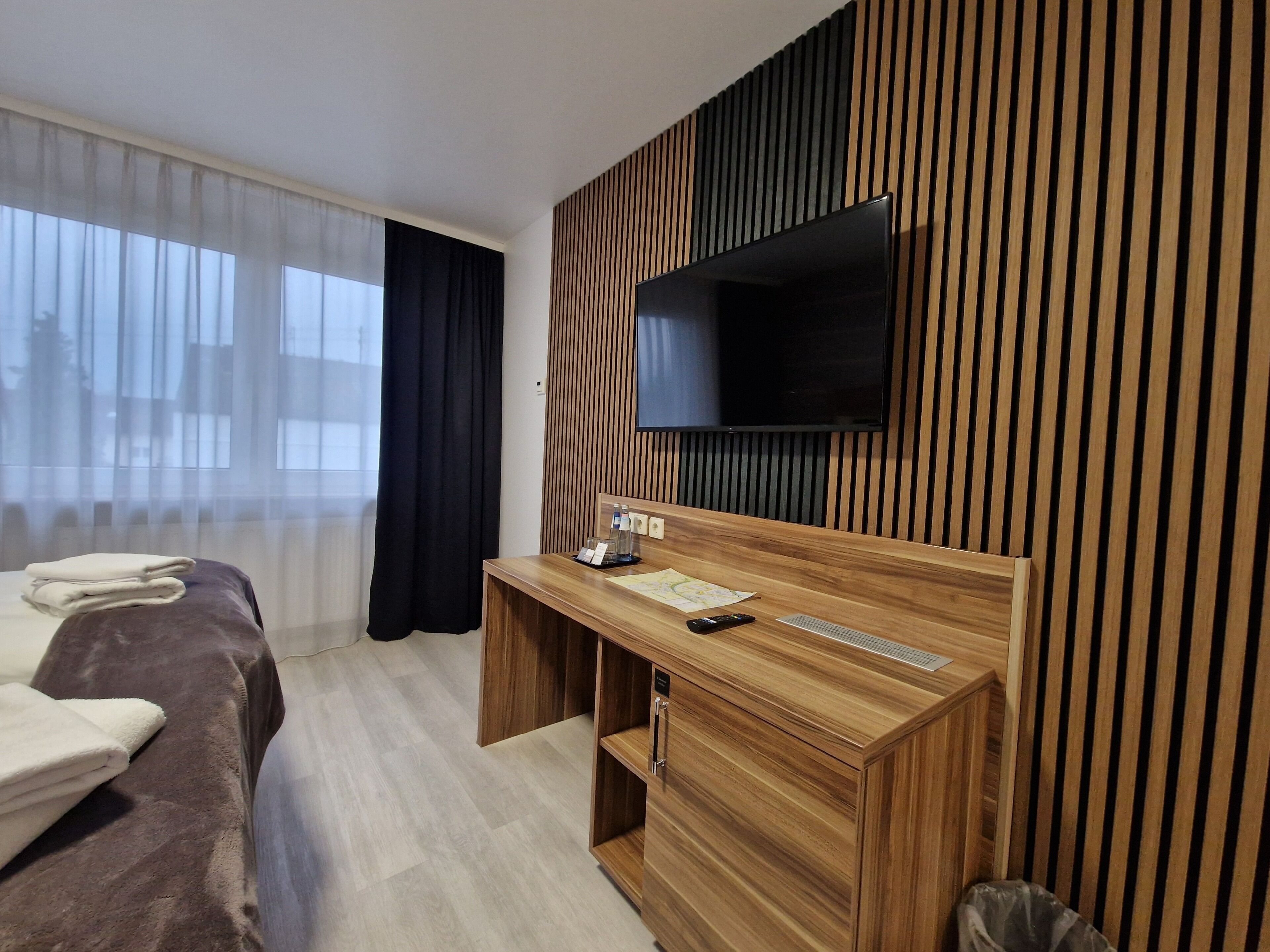 Habitación individual | Minibar, escritorio, cortinas blackout y insonorización 