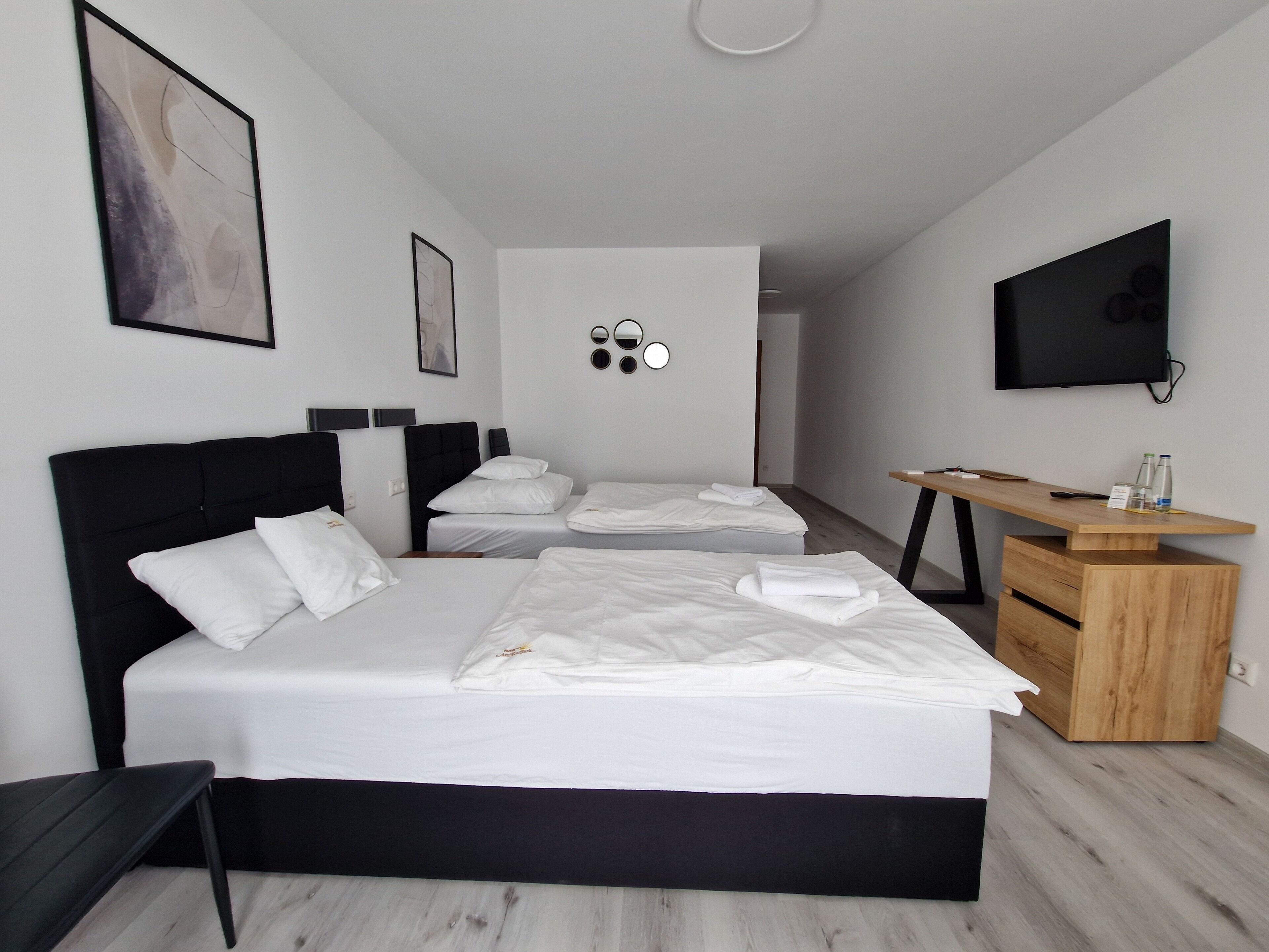 Triple Room | Minibar, desk, blackout drapes, soundproofing