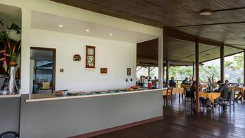 Breakfast, lunch, dinner served; local cuisine