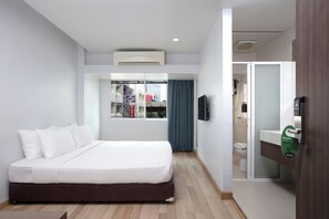 Standard Double Room | Minibar, in-room safe, desk, blackout curtains