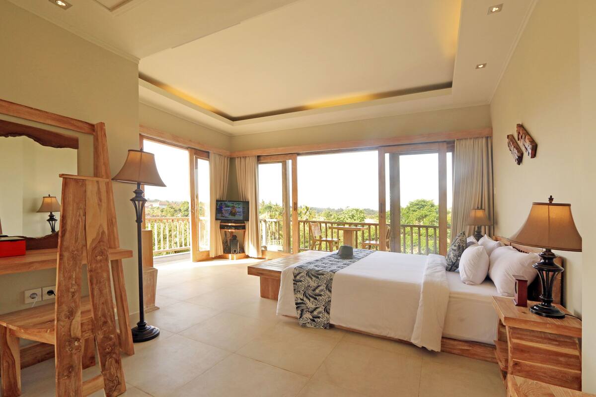 junior suite, 1 bedroom, garden view | minibar, in-room safe, individually decorated, individually furnished