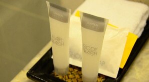Two tubes of hair and body wash on a tray. - The Embassy Sathorn (Bangkok)