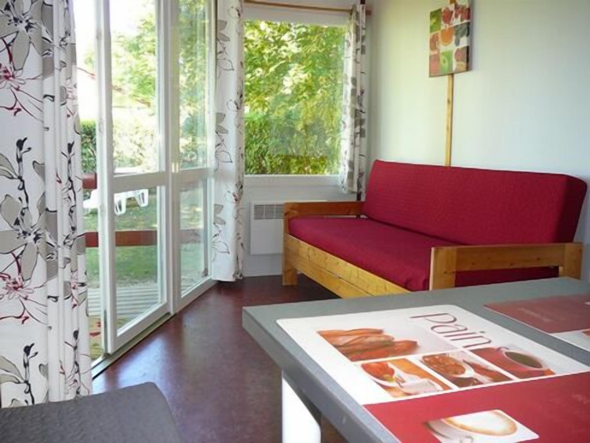 Flat-screen TV, foosball, table tennis, books