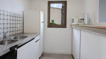 Apartment, 2 Bedrooms, Balcony, Sea View (T3) | Private kitchen | Full-size fridge, microwave, stovetop, coffee/tea maker