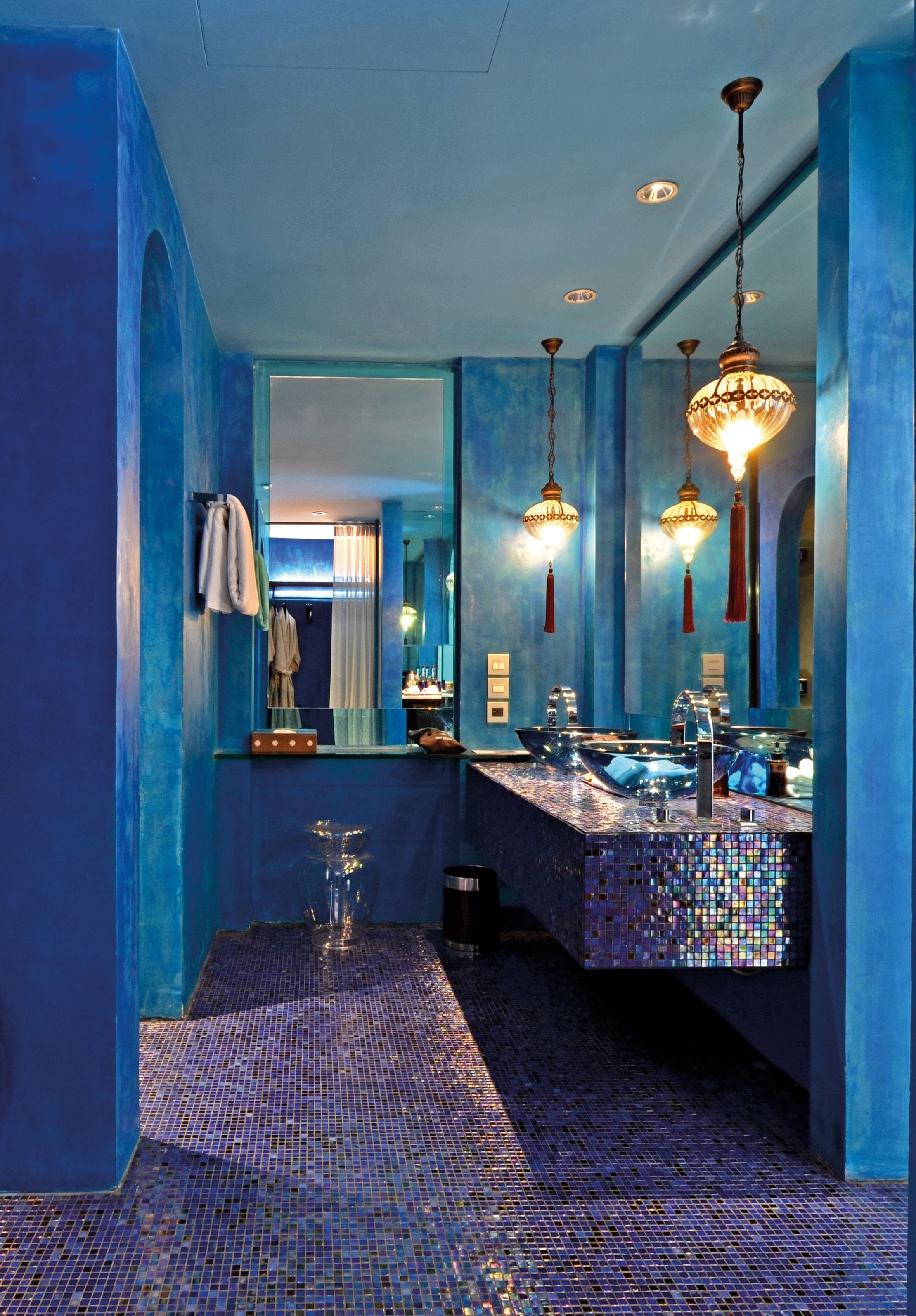 designer toiletries, hair dryer, bathrobes, slippers