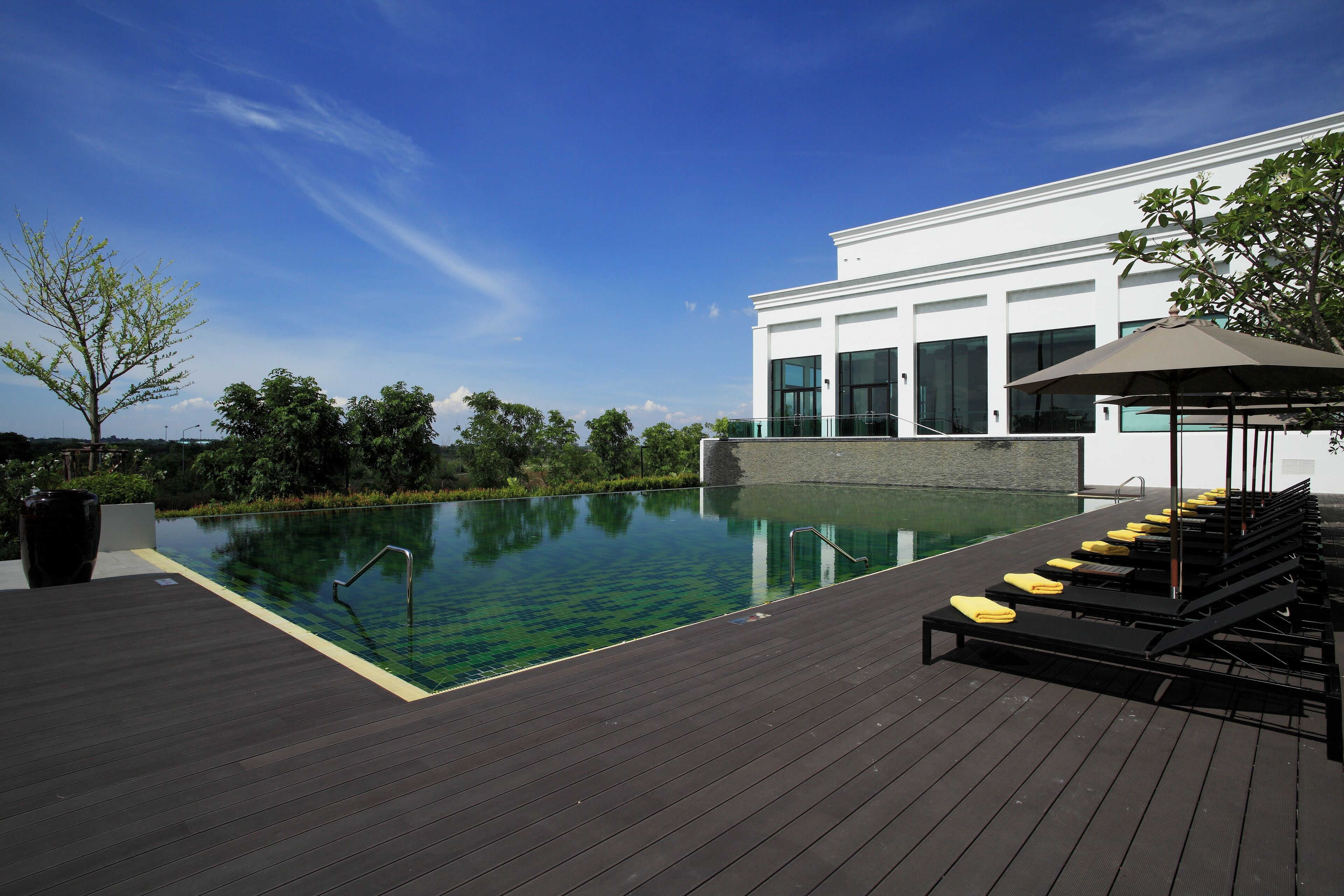 Outdoor pool, open 7:00 AM to 8:00 PM, free cabanas, pool umbrellas