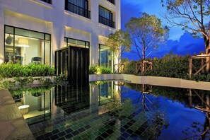 Outdoor pool, open 7:00 AM to 7:00 PM, free cabanas, pool umbrellas
