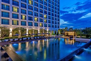 Outdoor pool, open 7:00 AM to 7:00 PM, free cabanas, pool umbrellas
