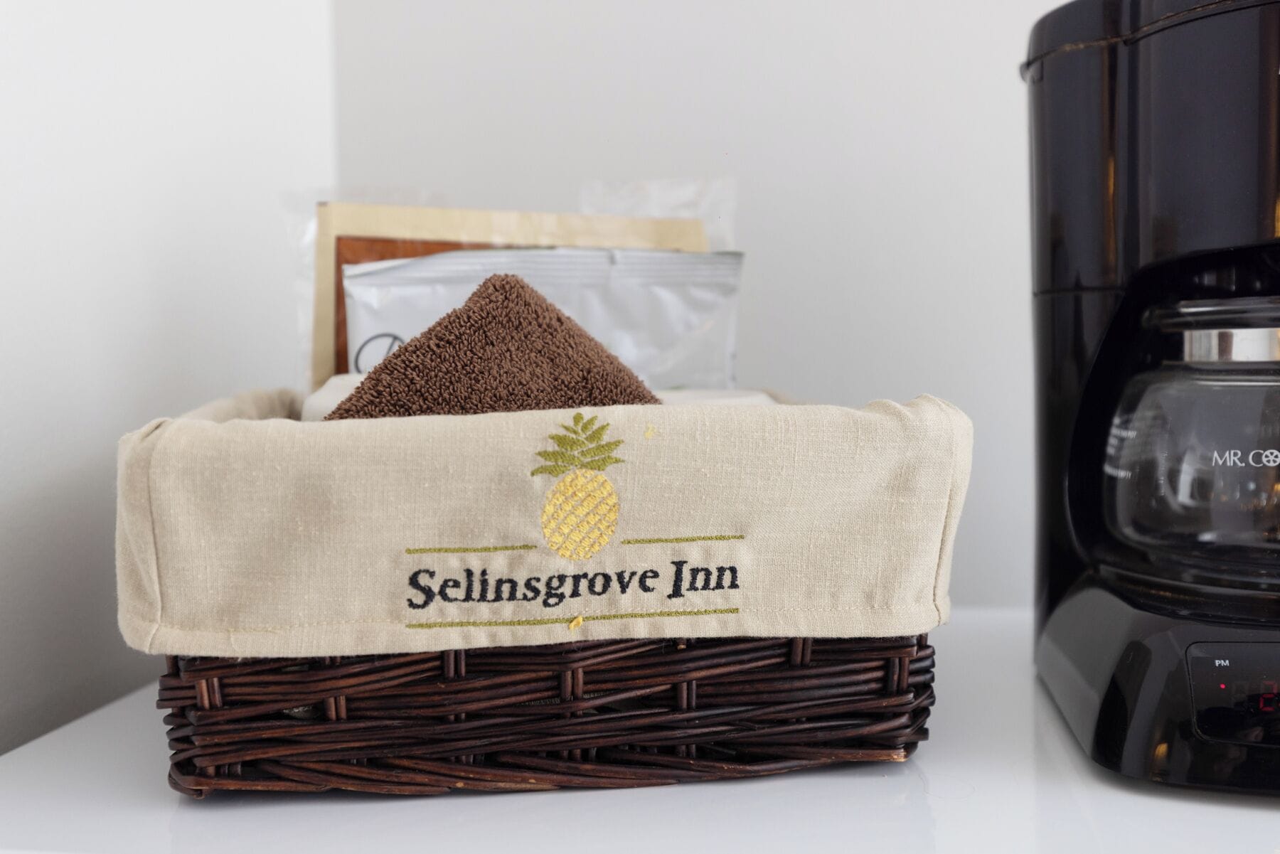 divided room, queen bed with queen sleep sofa | coffee and/or coffee maker