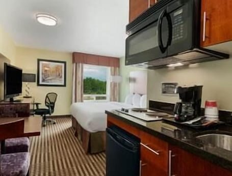 Fridge, microwave, stovetop, coffee/tea maker. Ramada by Wyndham Carlyle
