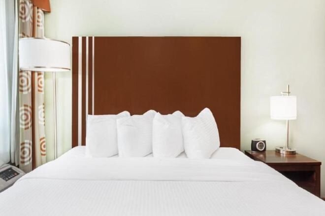 Desk, laptop workspace, blackout curtains, iron/ironing board