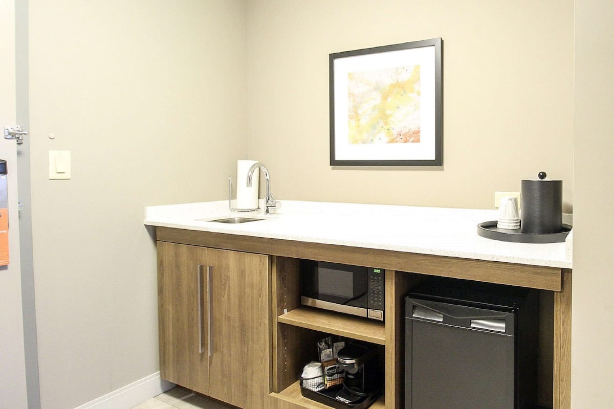 room, 1 king bed with sofa bed | bathroom | free toiletries, hair dryer, bathrobes, towels