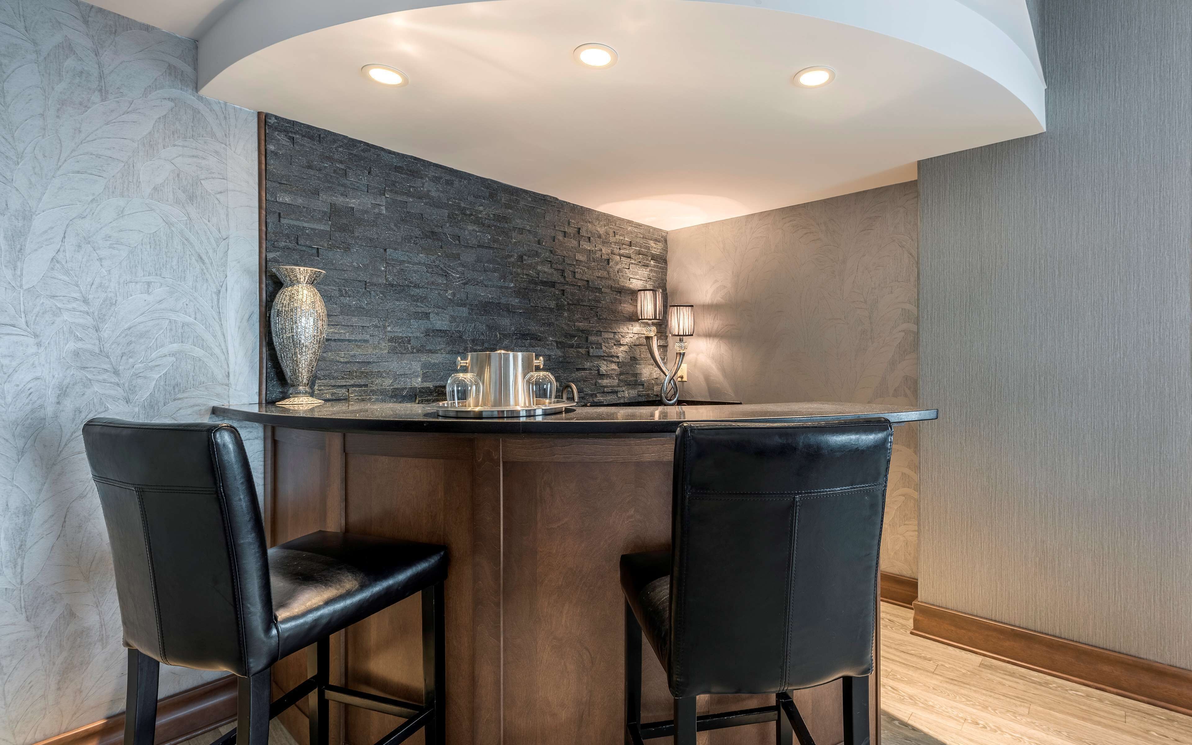 suite with king bed & living room | living area | 55-inch lcd tv with digital channels, tv, mp3 dock