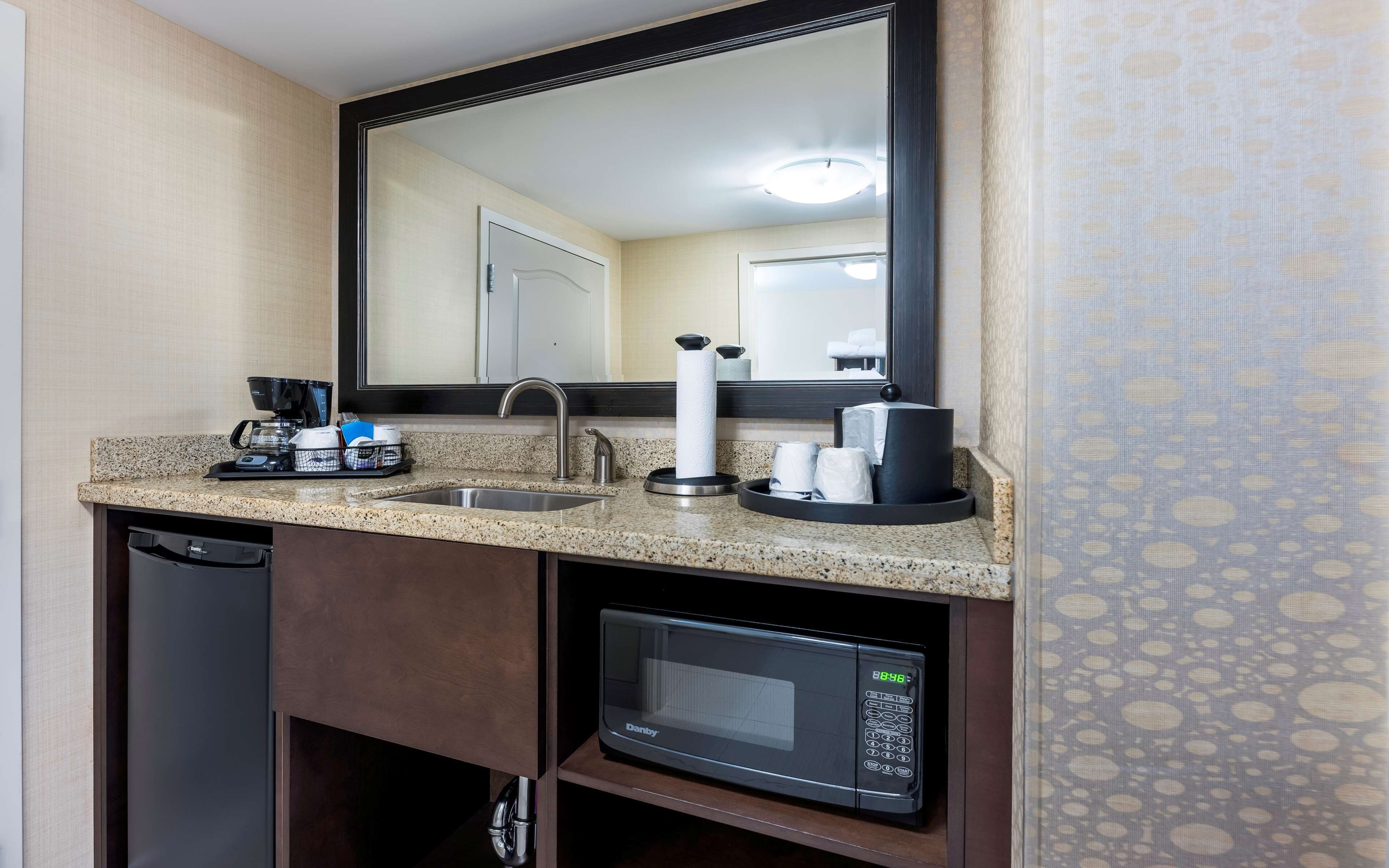 premium bedding, pillow-top beds, desk, blackout curtains