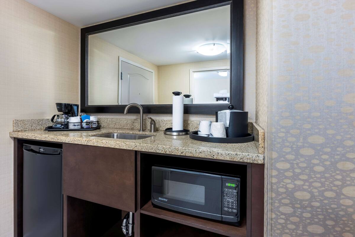 premium bedding, pillow-top beds, desk, blackout curtains