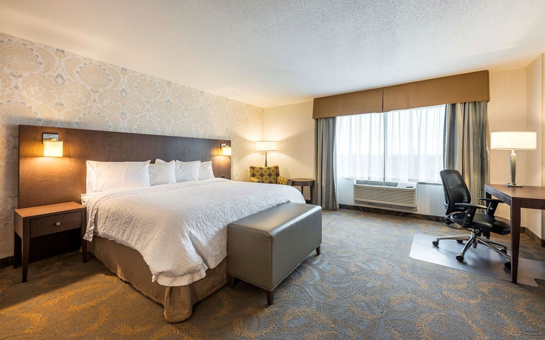 Premium bedding, pillowtop beds, desk, blackout drapes