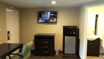 Een 40-inch flatscreentelevisie met kabelzenders en televisie