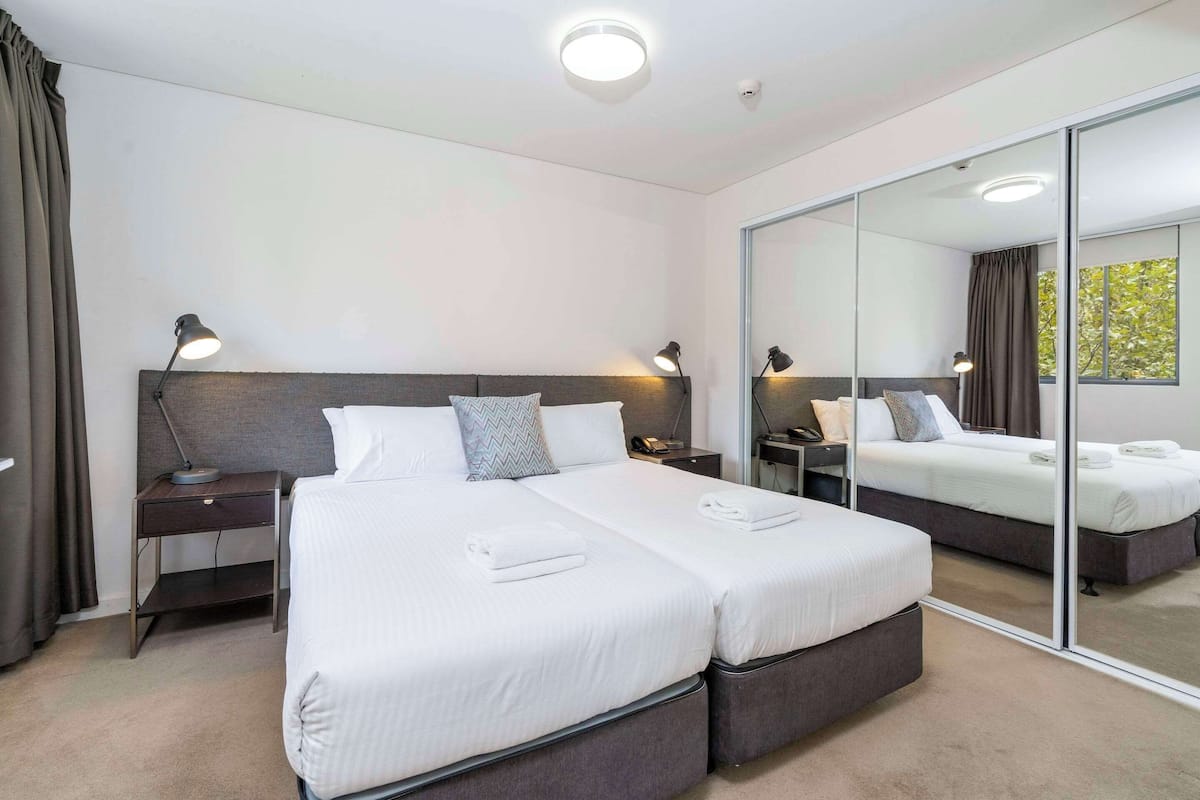 Suite, Non Smoking (1 Queen Bed & 2 Twin Beds) | Minibar, in-room safe, individually decorated, individually furnished