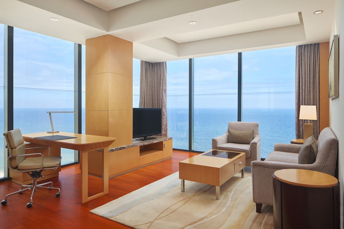 Suite, 1 King Bed, Non Smoking, Ocean View | Living area | LCD TV, DVD player