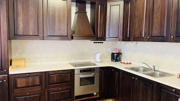 Superior Condo | Private kitchen | Dining tables