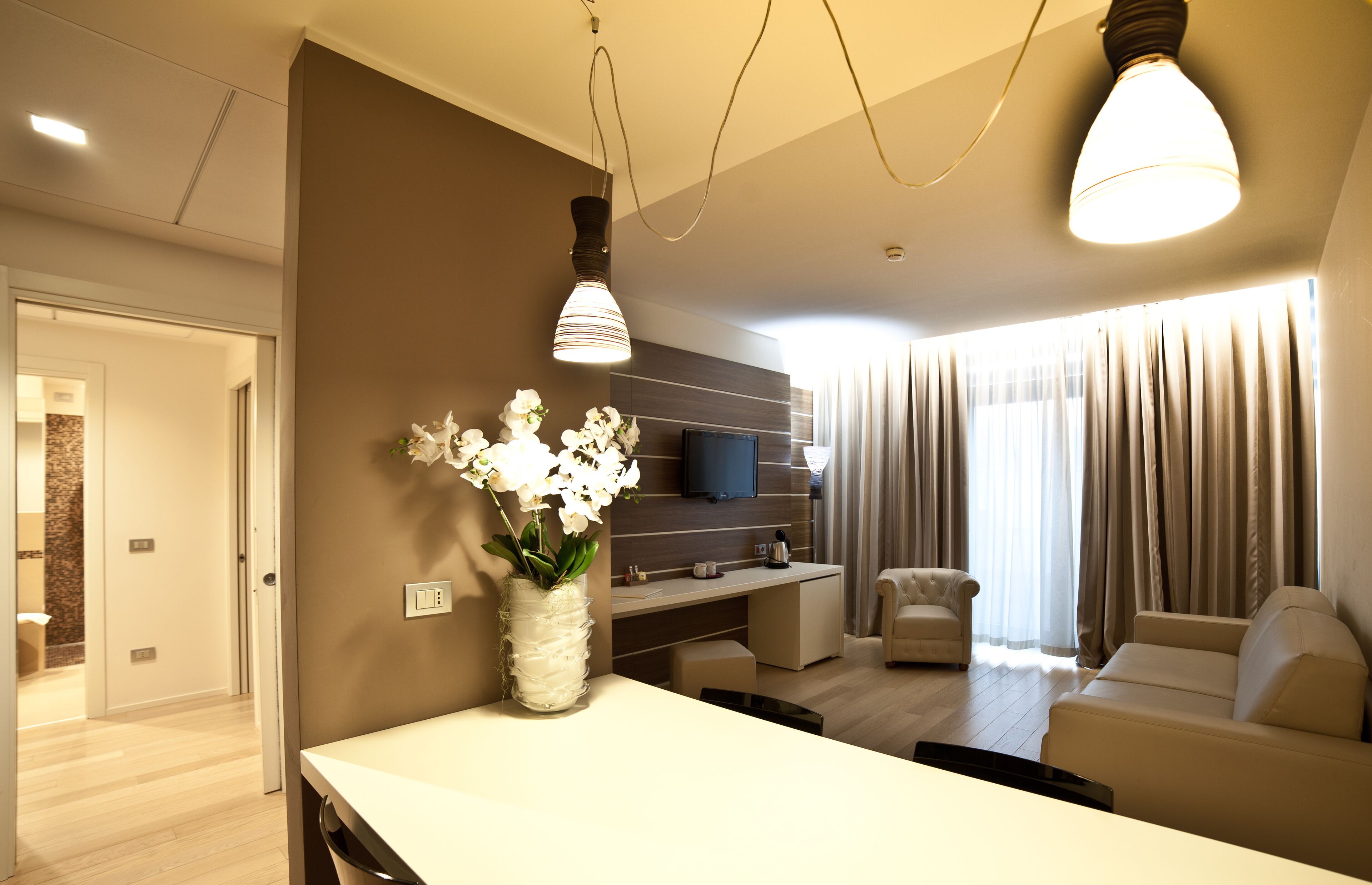 family studio suite | living room | 43-inch smart tv with satellite channels, streaming services