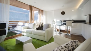 Apartamento Deluxe, 2 habitaciones, vistas a la montaña (with Fireplace) | Zona de estar