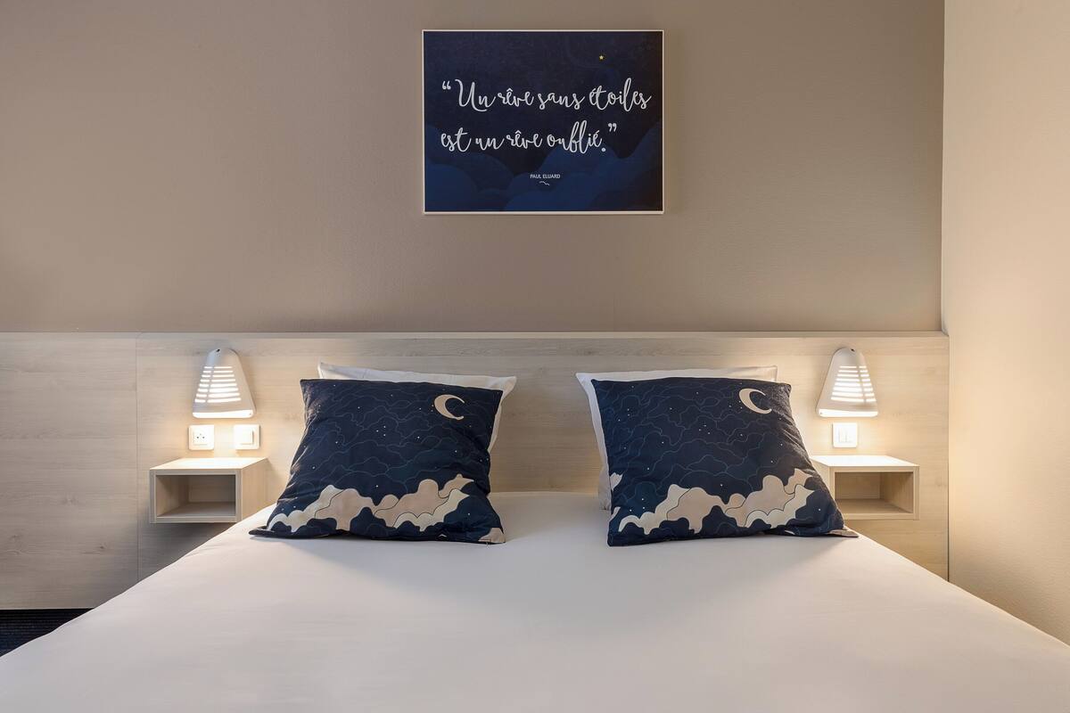 premium bedding, memory-foam beds, desk, blackout curtains