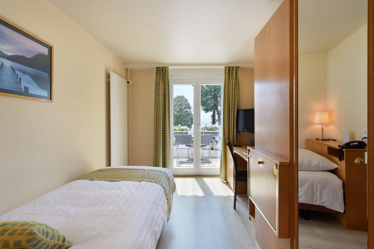 Standard Single Room, Lake View | Desk, blackout curtains, free WiFi, bed sheets