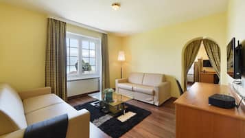 Standard Suite | Living room | Flat-screen TV