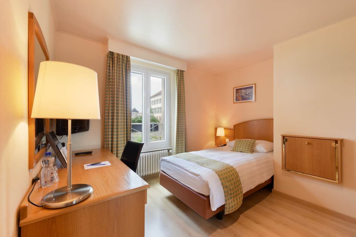 Economy Single Room | Desk, blackout curtains, free WiFi, bed sheets