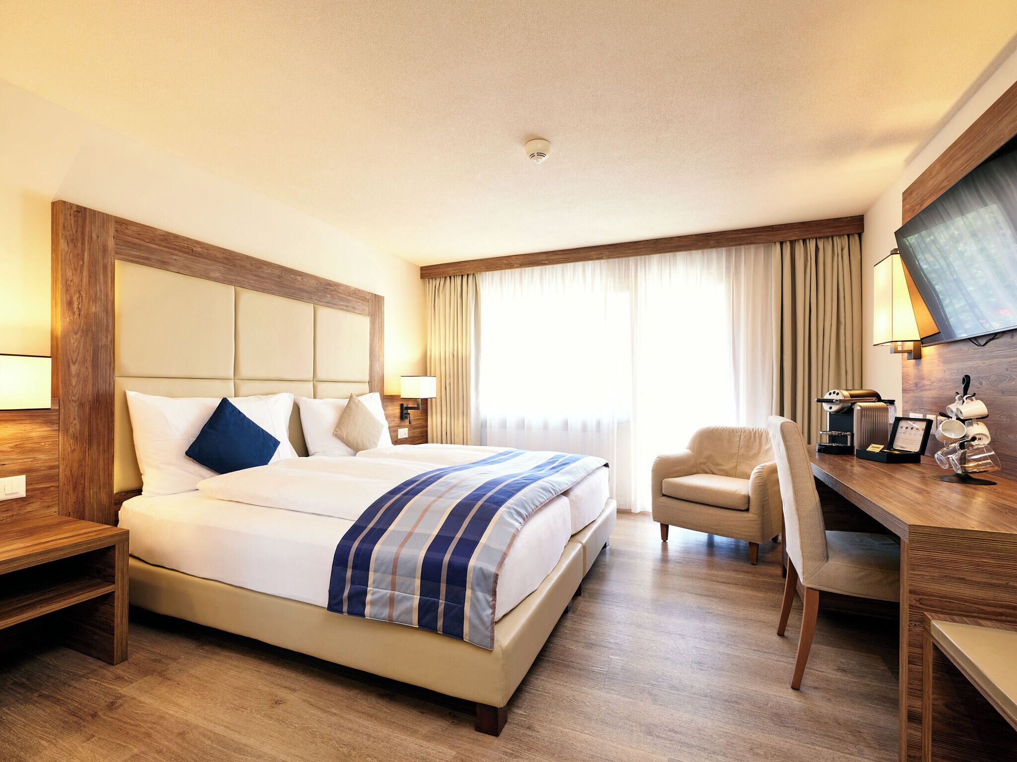Premium bedding, pillow-top beds, minibar, in-room safe