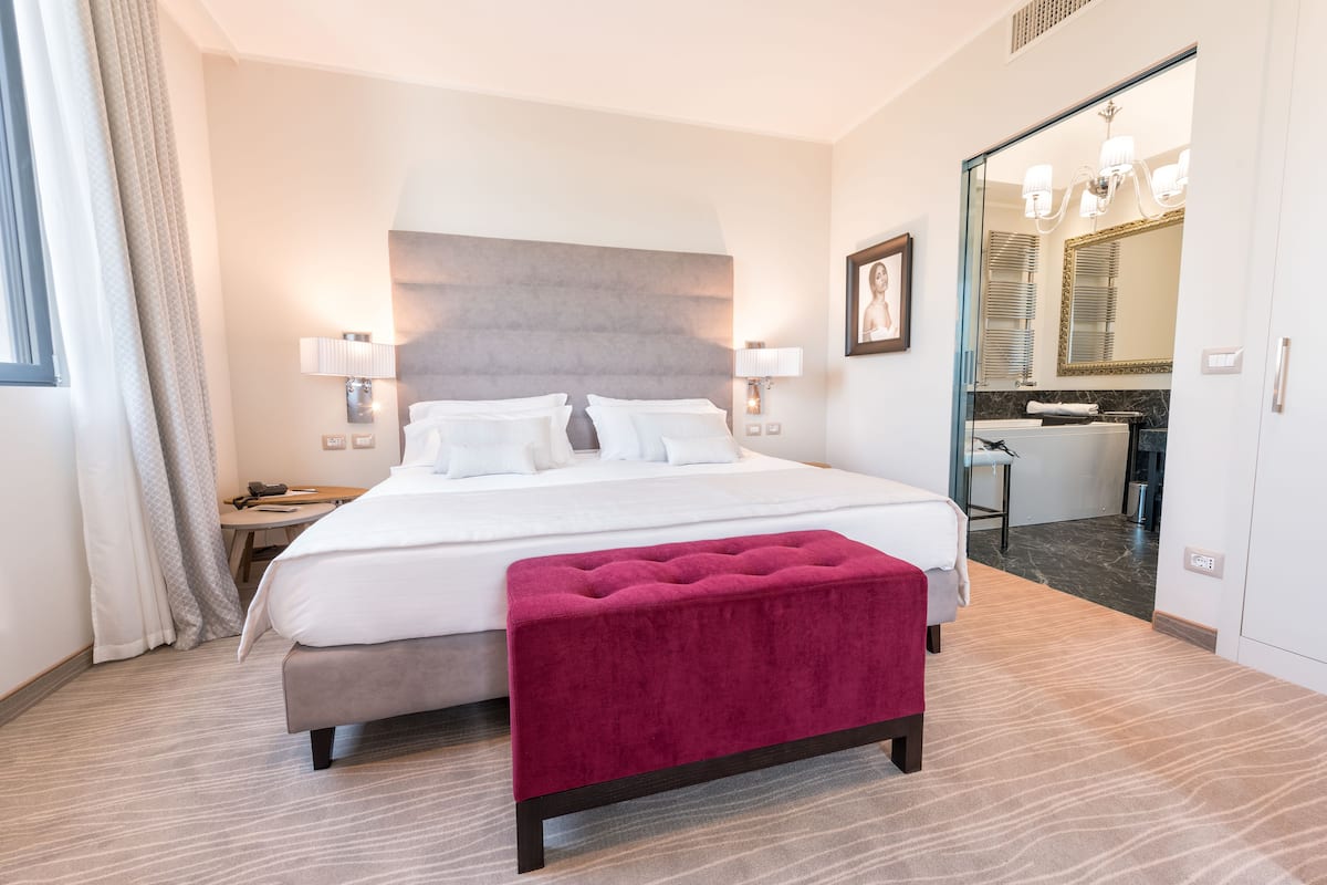 deluxe double room | premium bedding, in-room safe, individually decorated