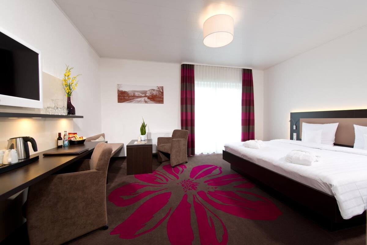 Hypo-allergenic bedding available, minibar, in-room safe, desk
