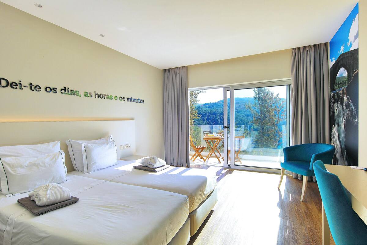 Deluxe Double or Twin Room | Minibar, in-room safe, desk, soundproofing