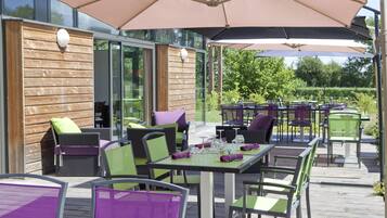 Breakfast, lunch, dinner served; garden views