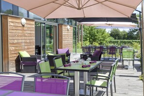 Breakfast, lunch, dinner served; garden views