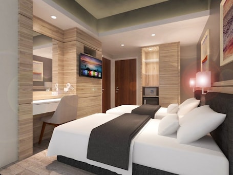 Deluxe Room, 2 Twin Beds | Down comforters, minibar, in-room safe, individually decorated. Grand Hallmark Hotel Johor Bahru