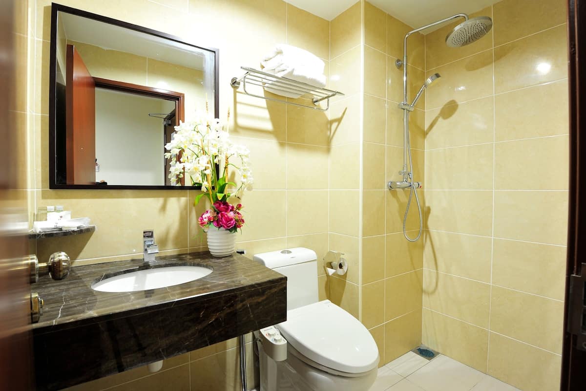 Shower, rainfall showerhead, designer toiletries, hair dryer