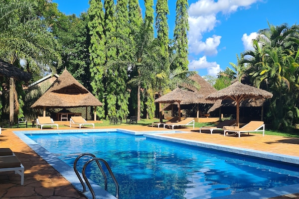 Outdoor pool, free cabanas, pool umbrellas