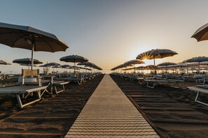Private beach, sun loungers, beach umbrellas, beach towels