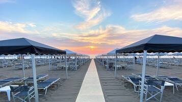 Private beach, sun loungers, beach umbrellas, beach towels