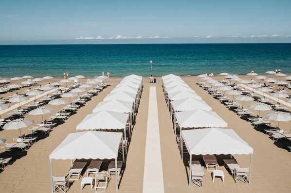 Private beach, sun loungers, beach umbrellas, beach towels