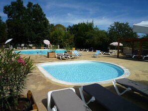 Outdoor pool, pool umbrellas, pool loungers