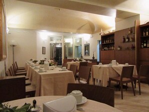 Enjoy dining in style with beautifully set tables and elegant decor.